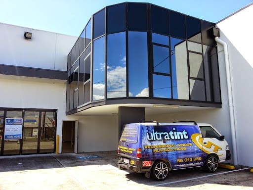 Commercial glazing project with installed privacy or solar film.